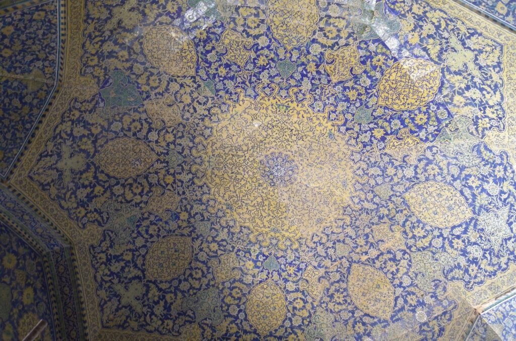 Close view of a tiled ceiling in the Shah Mosque