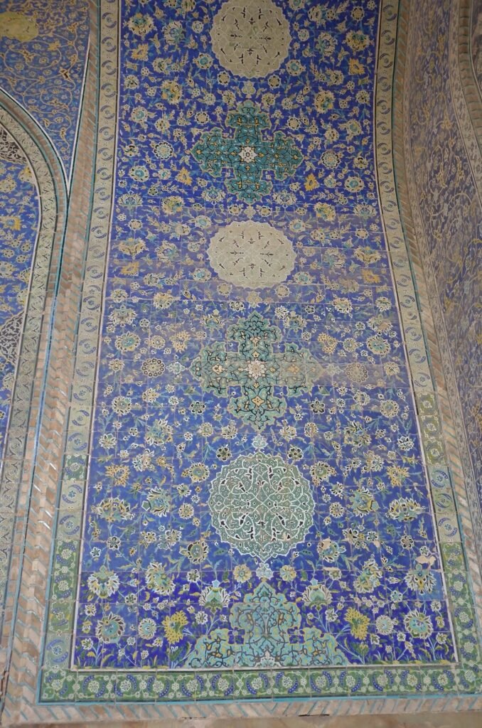 Wall panel with blue tile patterns in the Shah Mosque