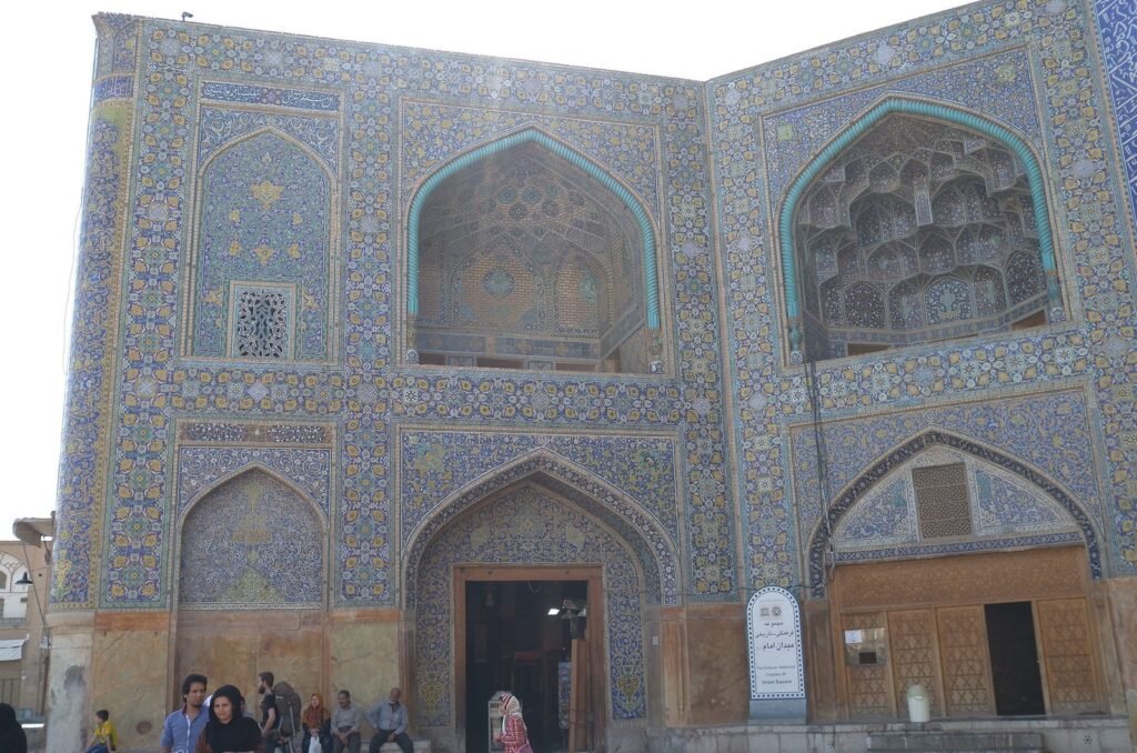 Tiled facade with two portals at the Shah Mosque