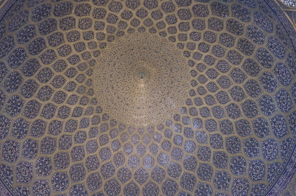 Inside of the dome of Sheikh Lotfollah Mosque with a pattern of tiles