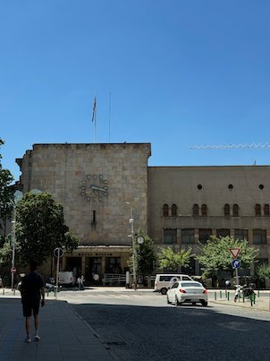 The Museum of the City of Skopje stands in the old railway station building with its clock.