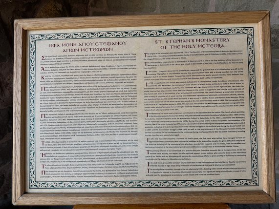 Board with the history of St. Stephen's Monastery in Greek and English