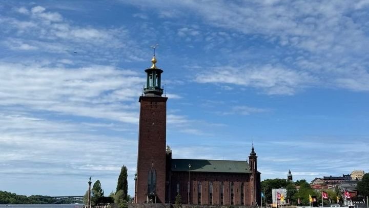 Stockholm City Hall seen from the water by boat, photographed by Zayera Khan