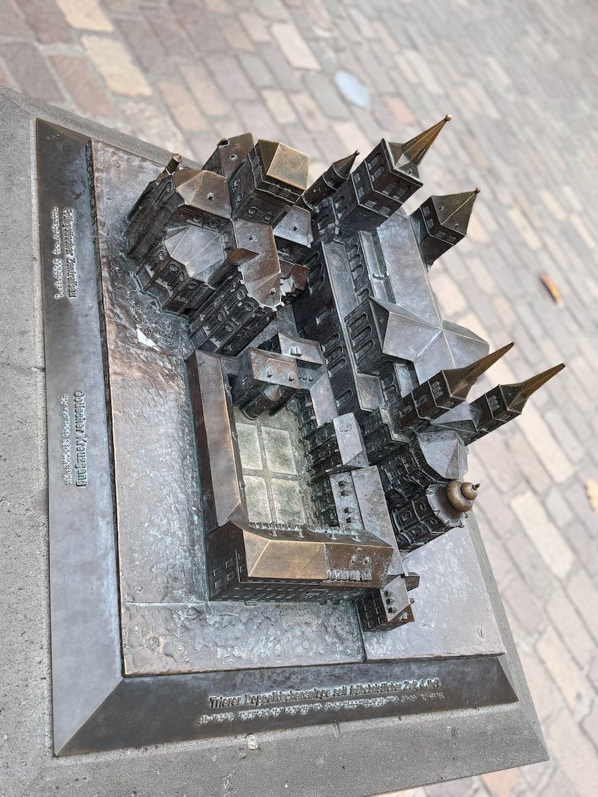 A bronze model shows Trier Cathedral and the Church of Our Lady from above.