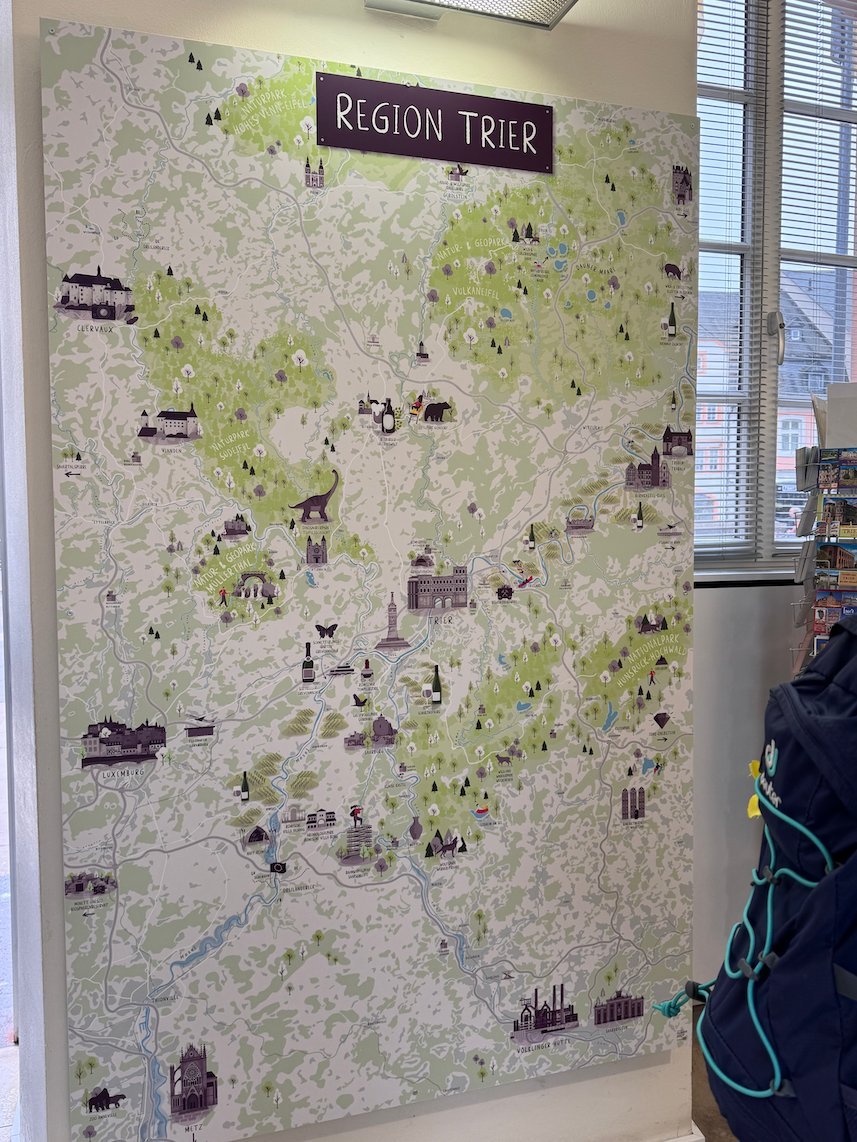 A large map of the Trier region hangs on a wall in the tourist office.