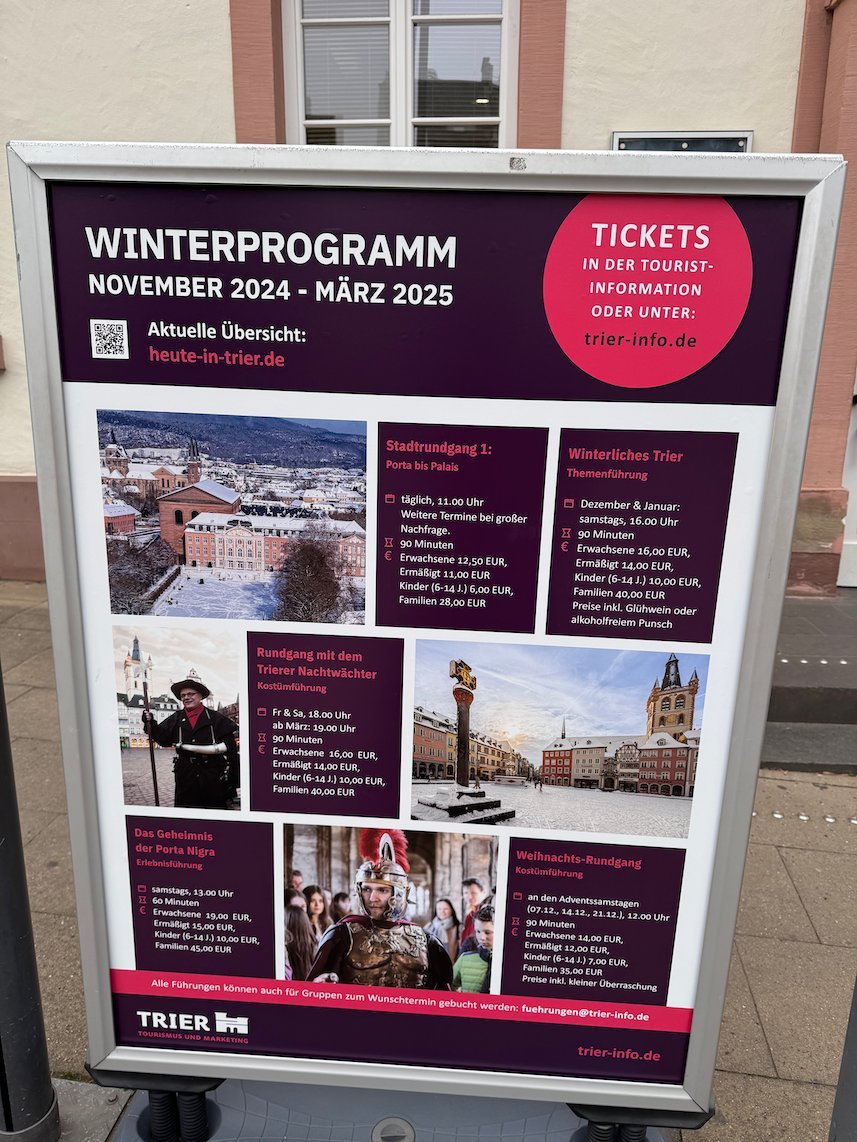 A poster shows the winter programme of guided tours in Trier.