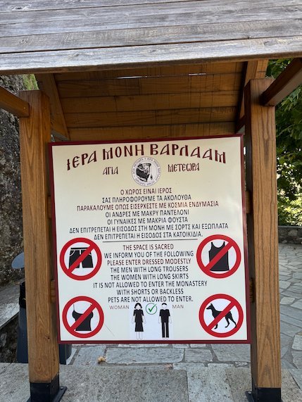 Sign at Varlaam Monastery with the dress code and rules for visitors