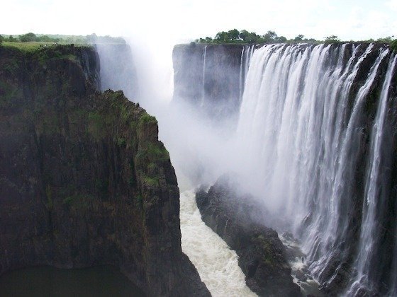 White water pours into a misty gorge at Victoria Falls on the Zambezi River.