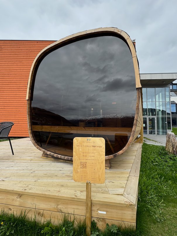 Wooden frame with a dark mirror surface, an outdoor art installation in Voss