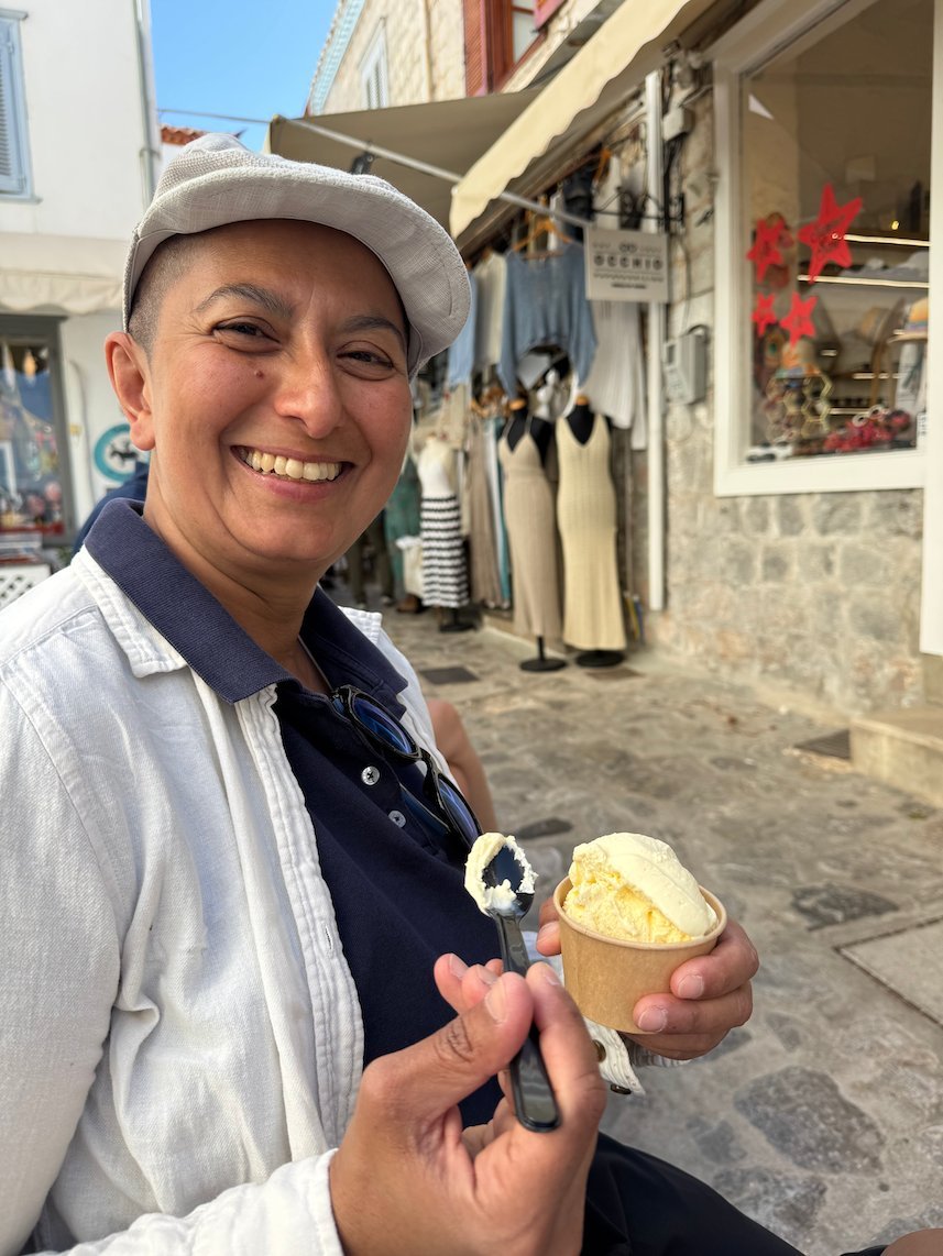 Zayera Khan with a cup of ice cream in a shopping lane in Hydra