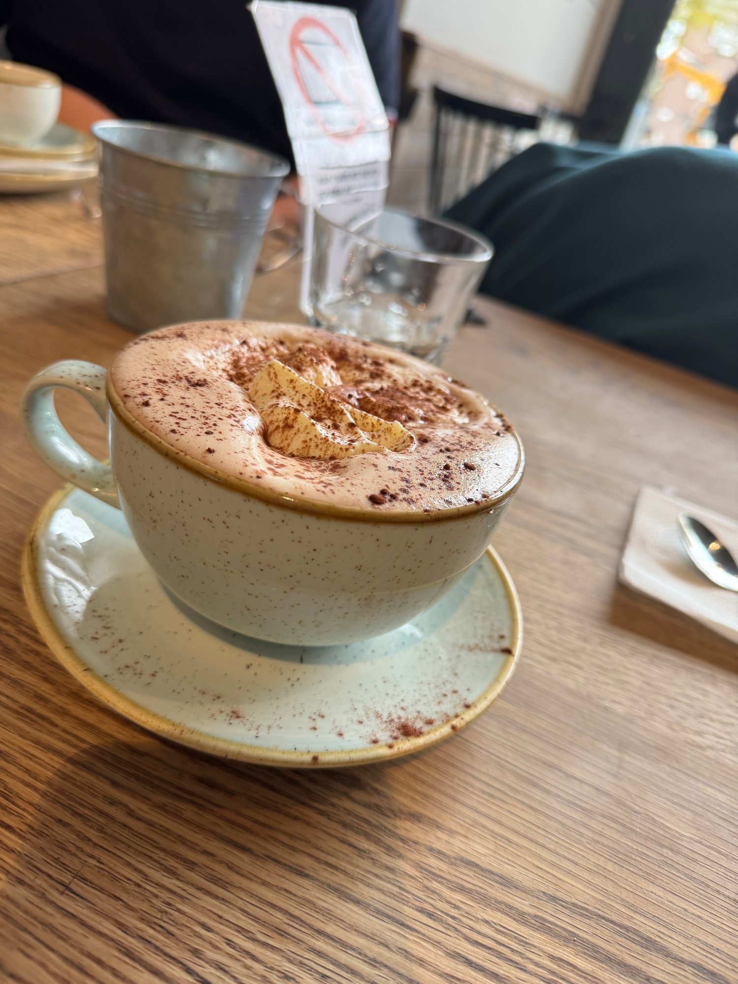 Coffee cup with latte art in a Stockholm café