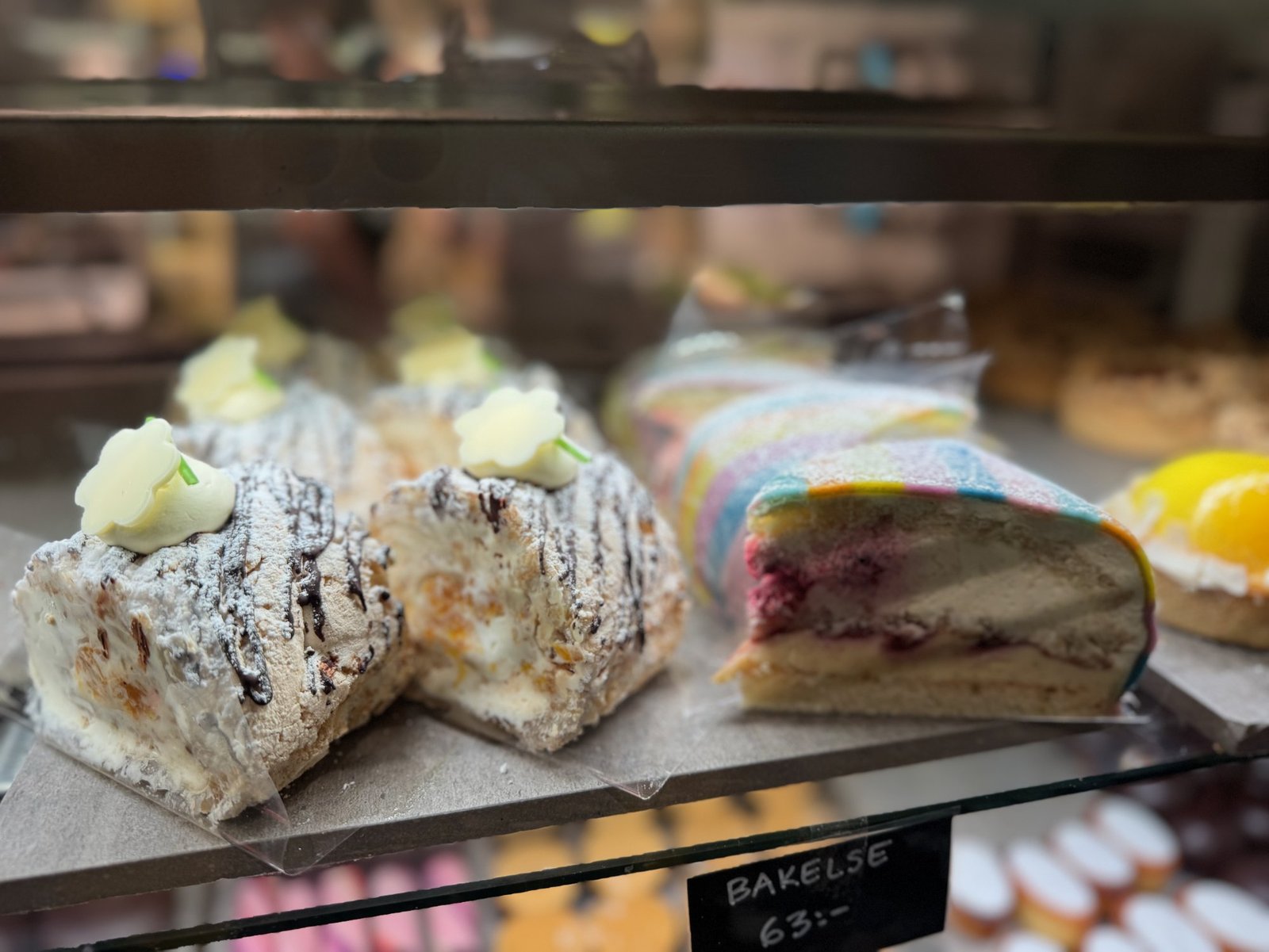 Colourful cakes in a bakery display, Stockholm