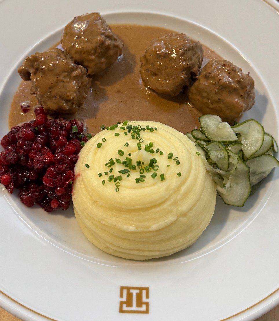 Traditional Swedish meatballs with lingonberry sauce at a Stockholm restaurant, photographed by Zayera Khan