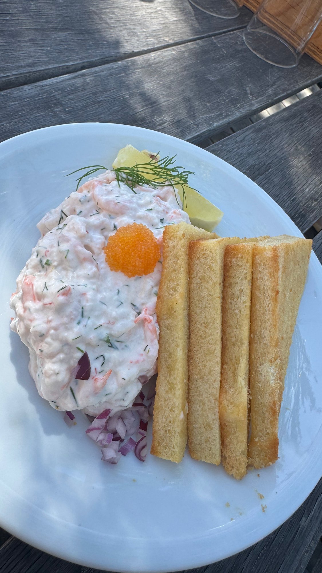 Räksmörgås, the Swedish shrimp sandwich, on a plate