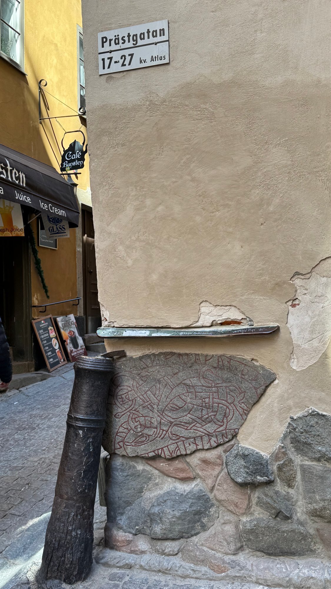 Runestone built into a house wall on Prästgatan in Gamla Stan