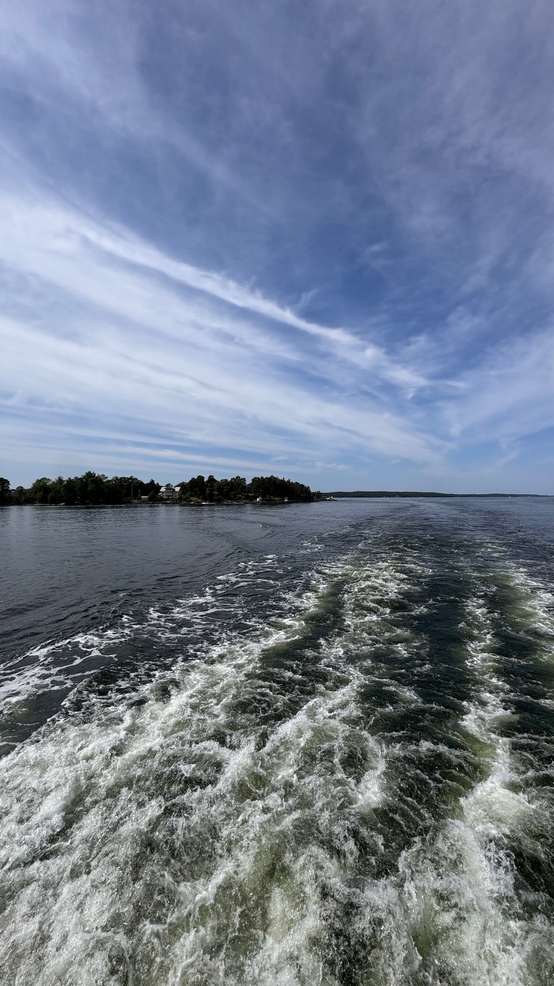 Boat wake and islands in the Stockholm archipelago