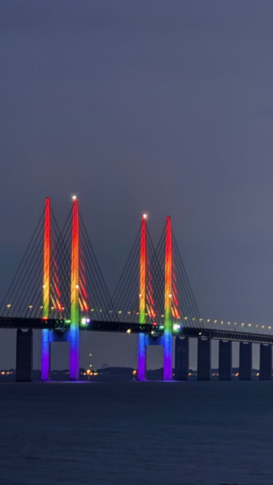 The Öresund Bridge lit in rainbow colours during Malmö Pride