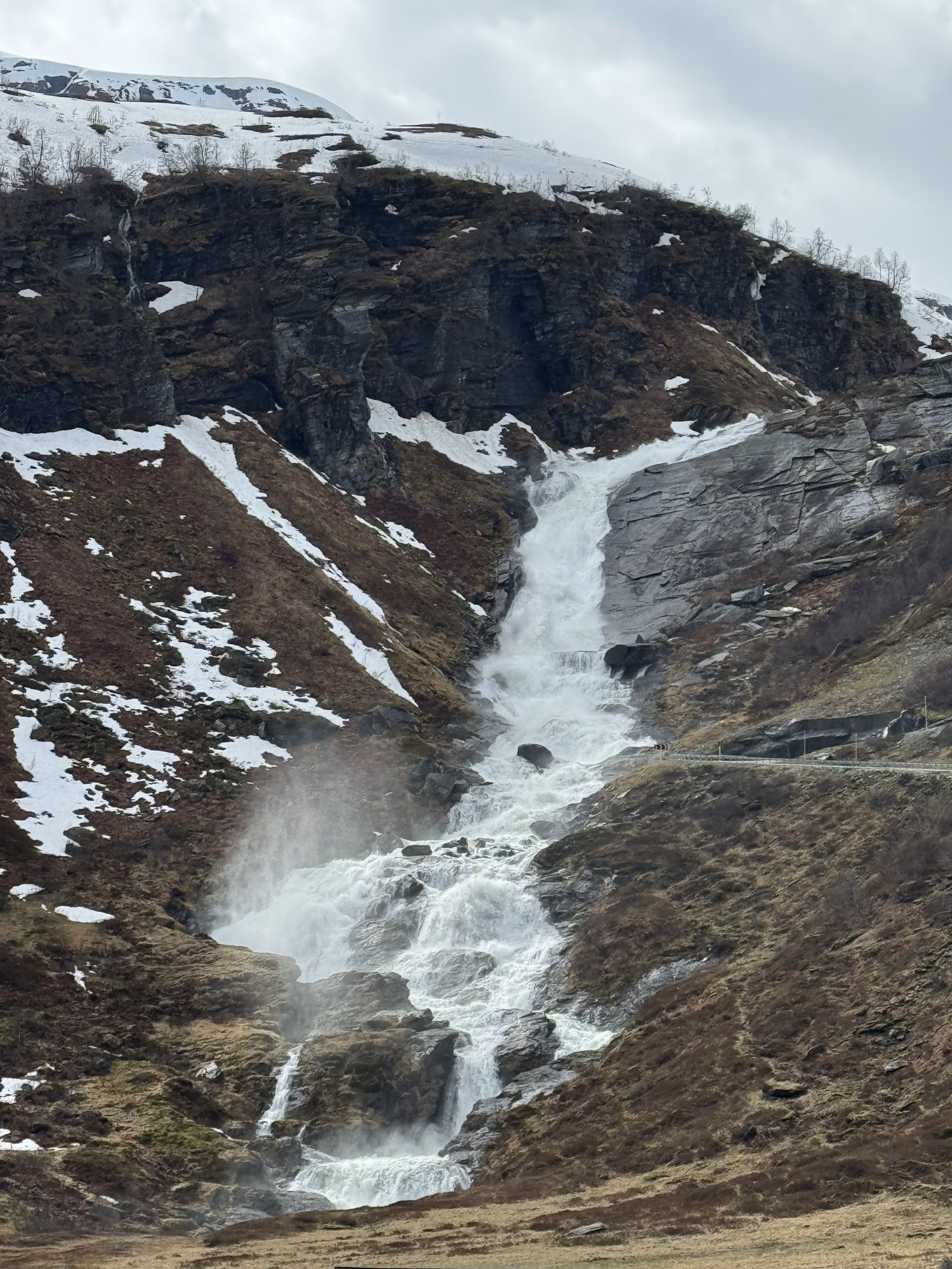 Waterfall from snowmelt on a mountainside